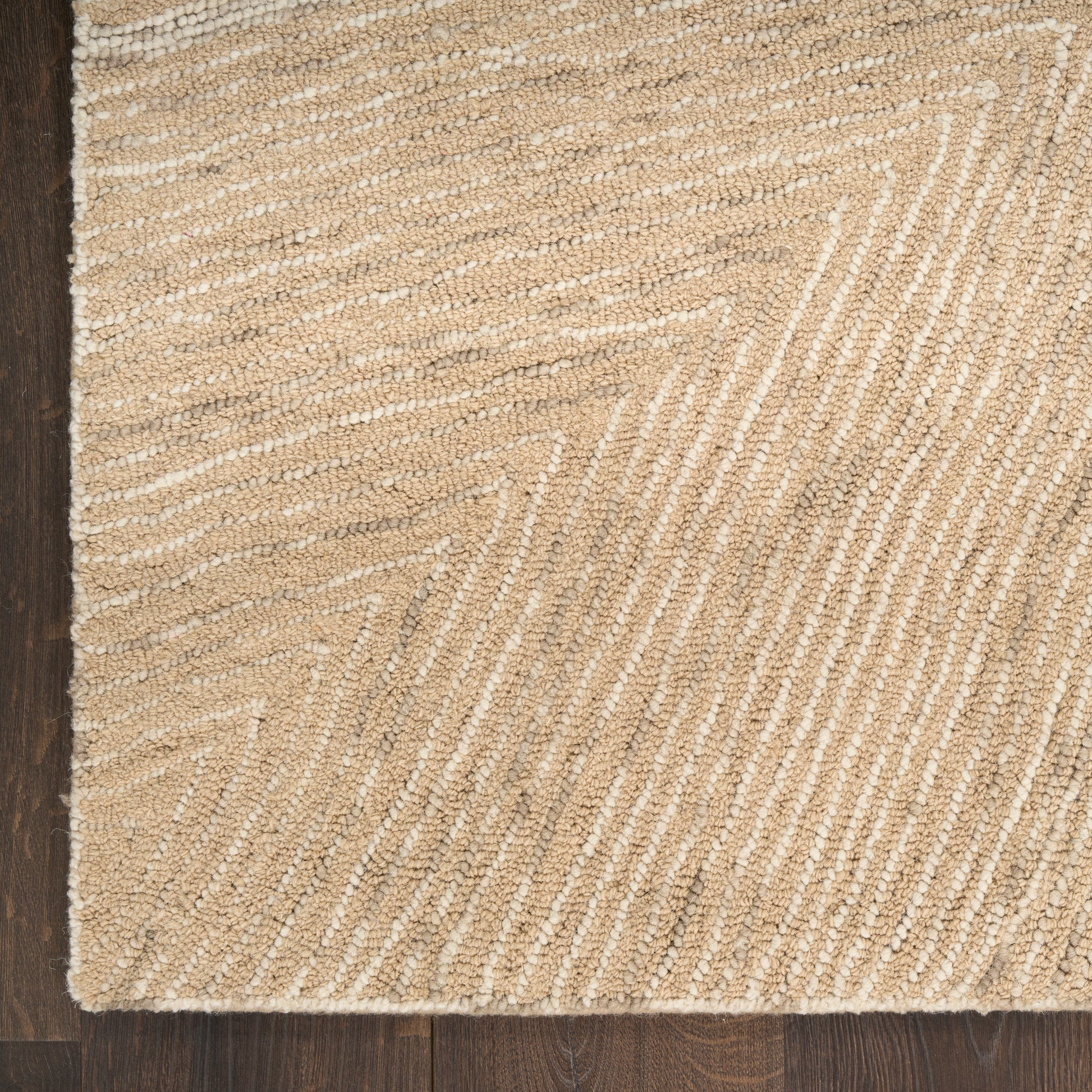 Natural beige woven jute runner rug with subtle chevron pattern on dark wood floor