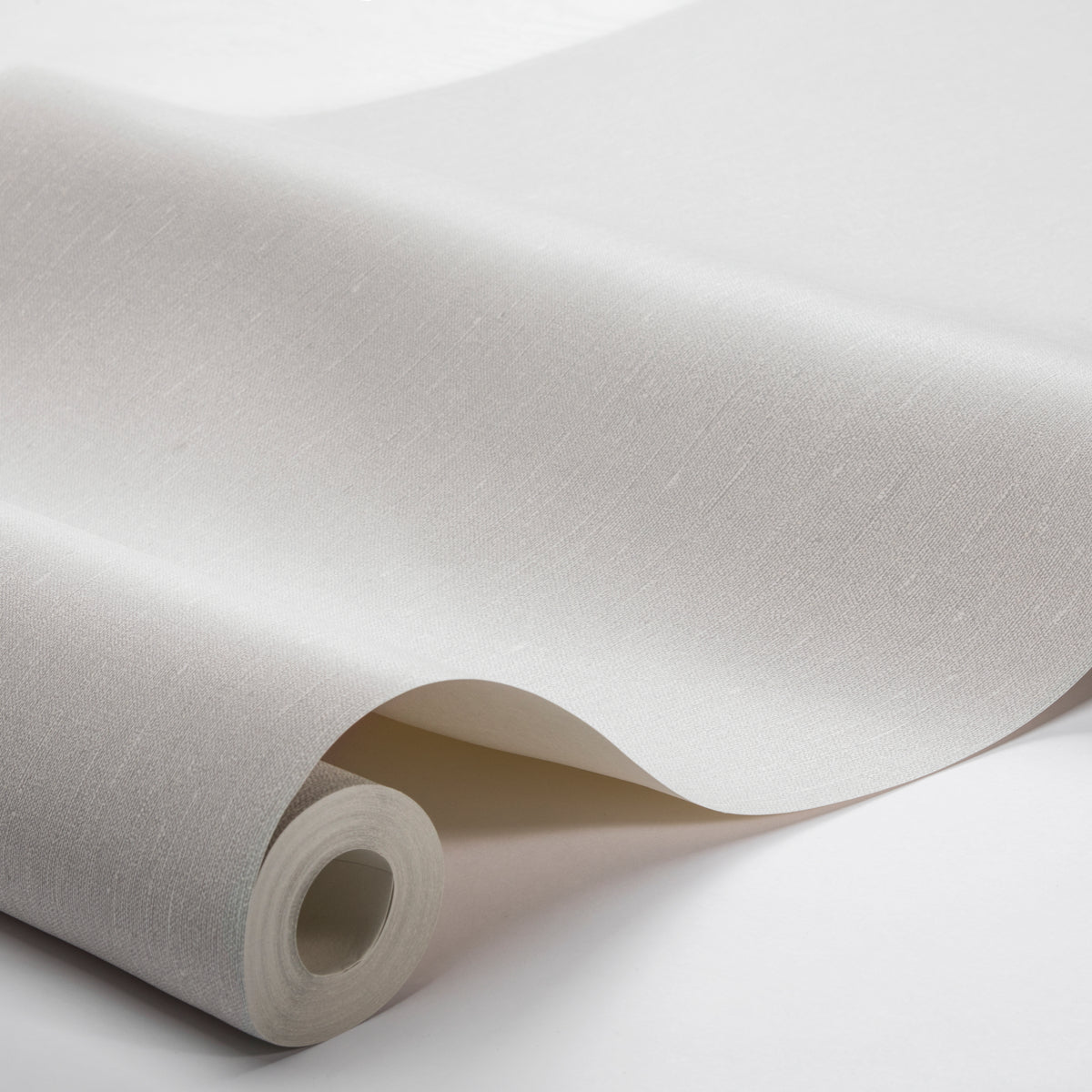 Light gray woven fabric roll with subtle texture, partially unrolled.