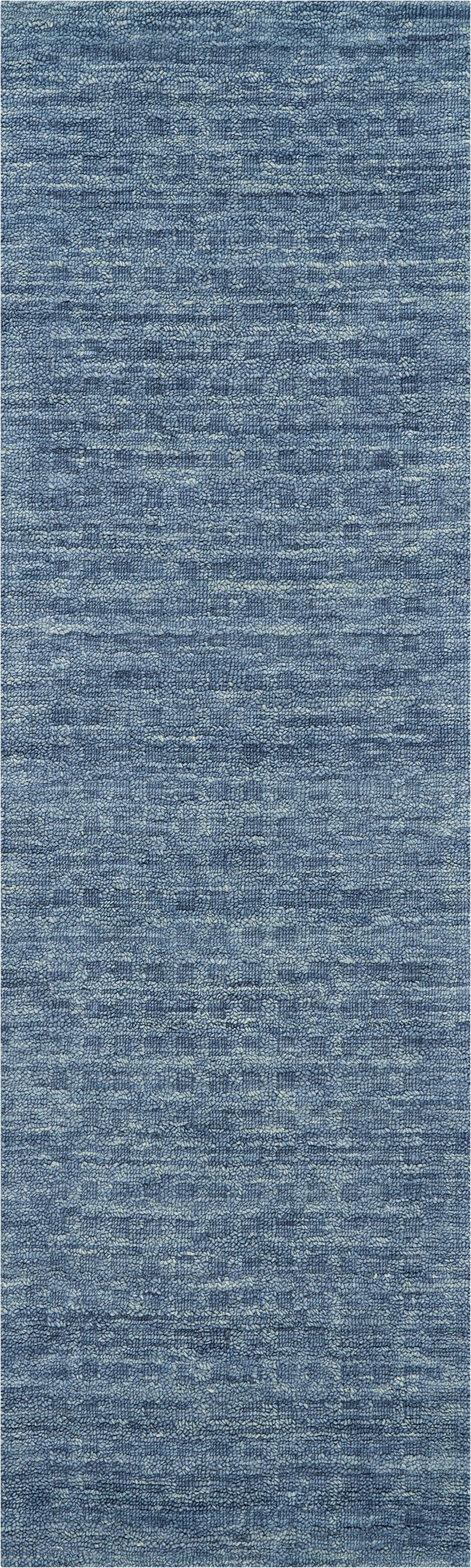 Blue textured woven runner rug with variegated light and dark blue tones; rectangular, 8 ft long.