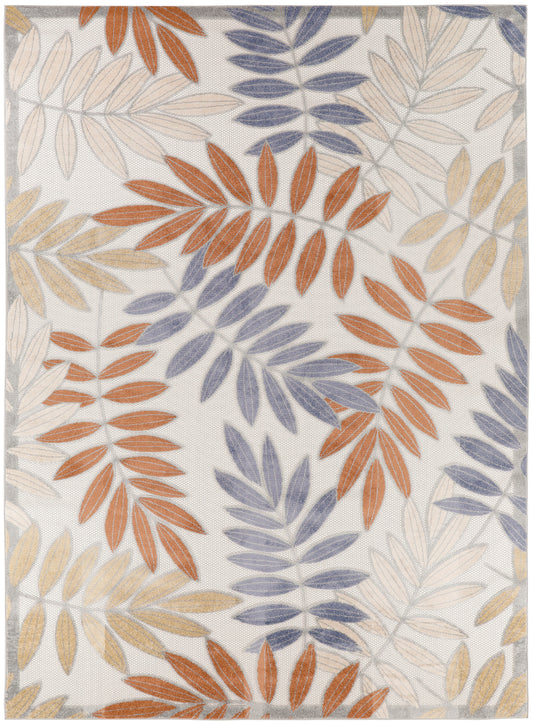 Outdoor woven rug with abstract leaf motif in rust, blue, beige and yellow on light background, 8' x 11', rectangular.