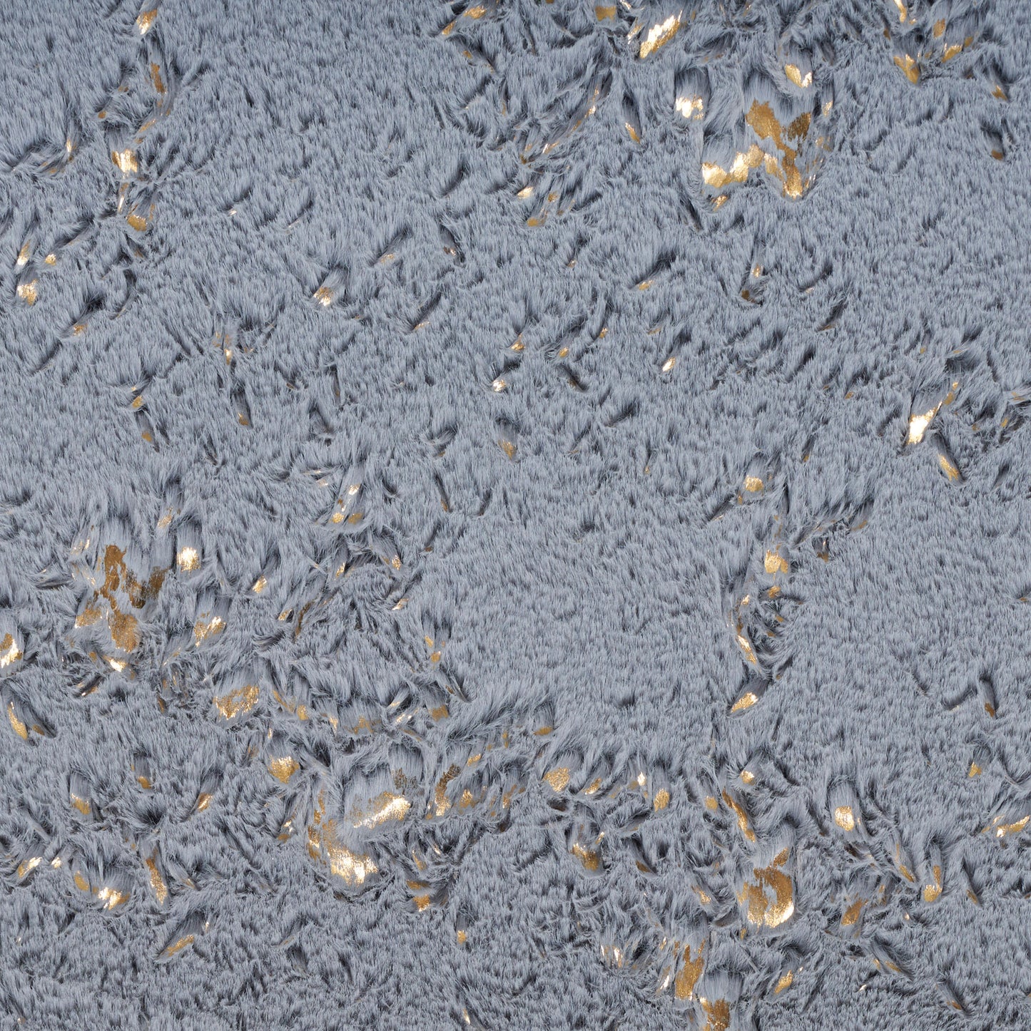 Blue-gray plush rug with scattered gold foil flecks and a soft shaggy texture.