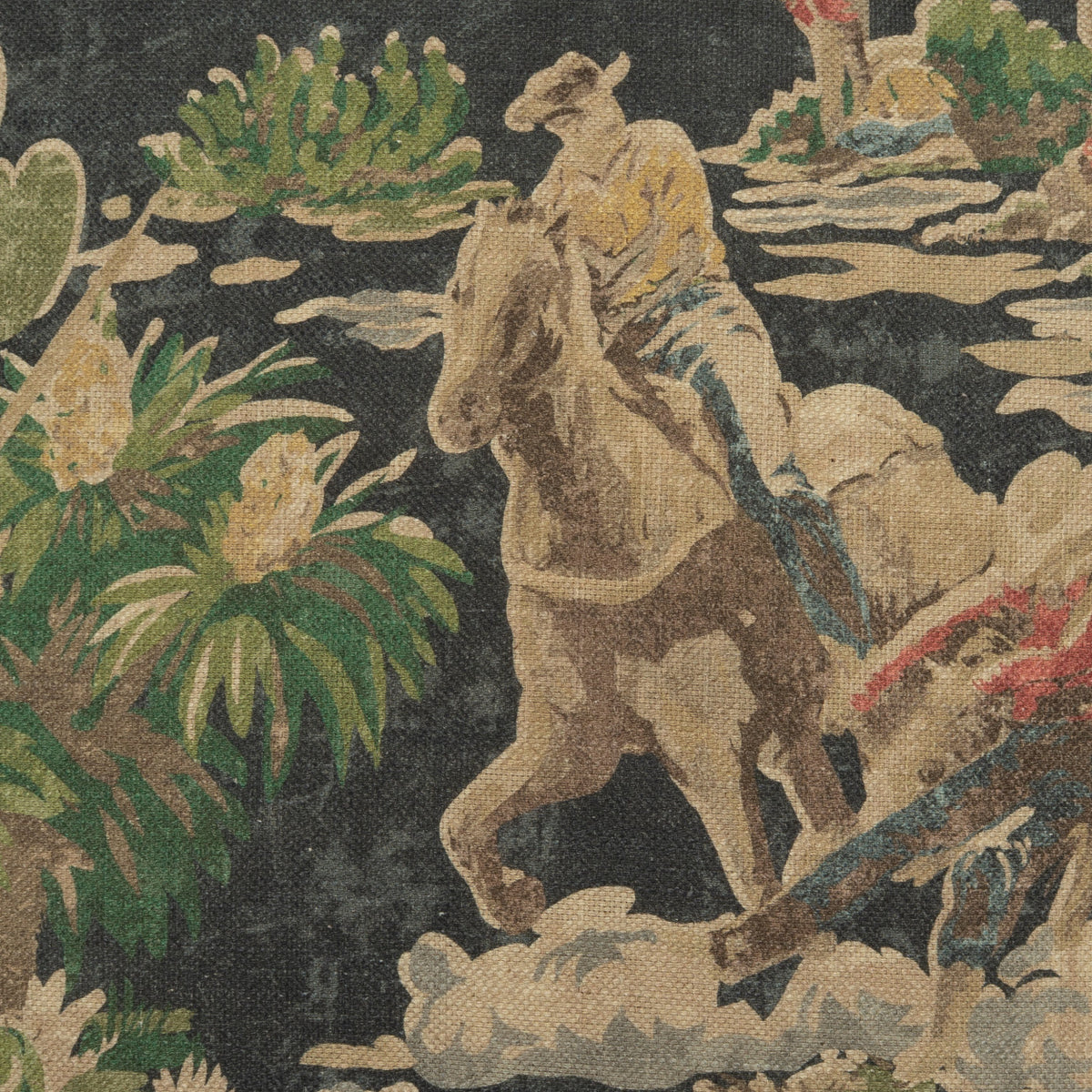 24x24 Saddler Denim designer throw pillow featuring a detailed scenic equestrian toile-style pattern on a deep denim-blue background, depicting a horseback rider, horses, lush plants, water, clouds and a pastoral landscape in muted green, tan and cream tones. Cotton and linen front with tan taupe linen-viscose reverse.