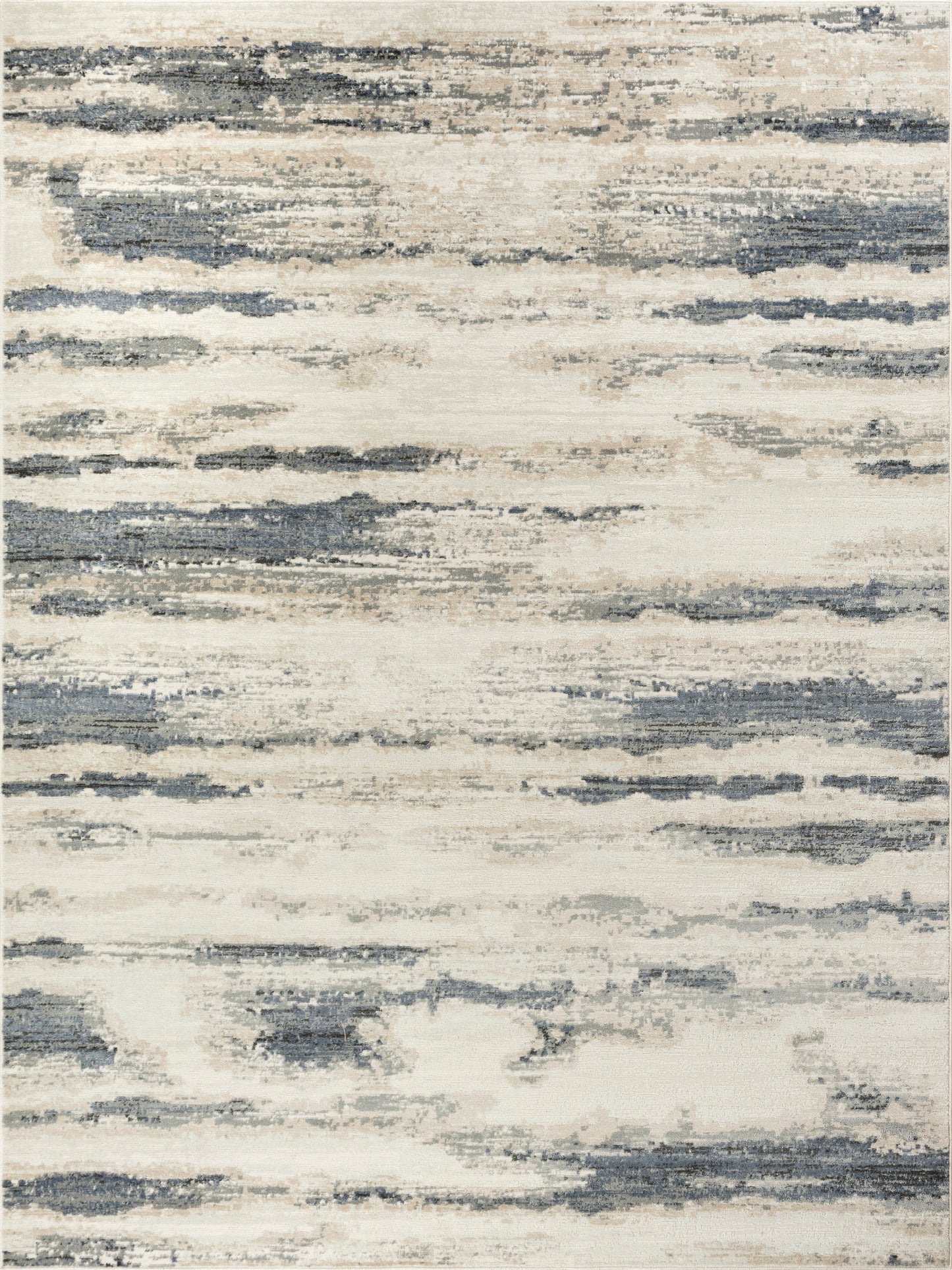 Abstract beige and blue-gray rug with irregular brushstroke pattern; modern living room decor.