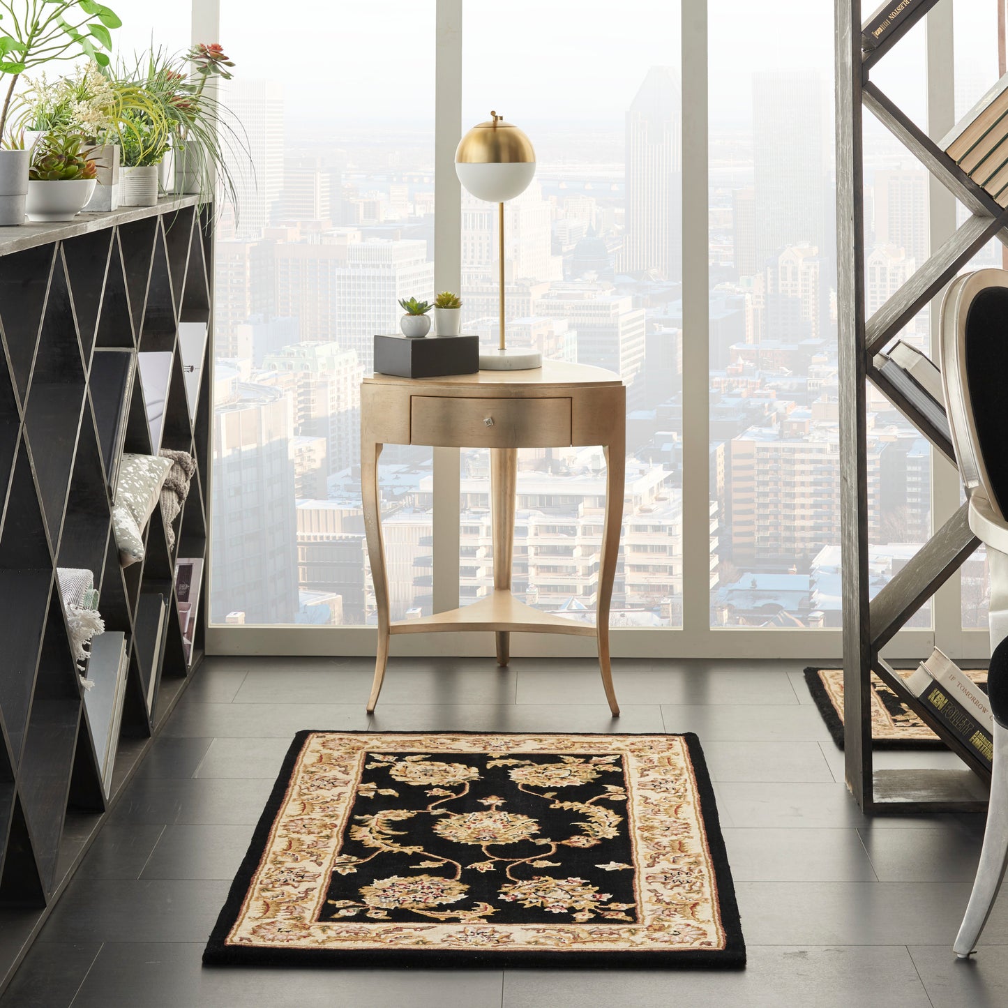 Traditional 3' x 4' ornate black-and-tan rug in a modern home office corner.