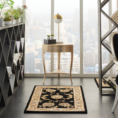 Traditional 3' x 4' ornate black-and-tan rug in a modern home office corner.