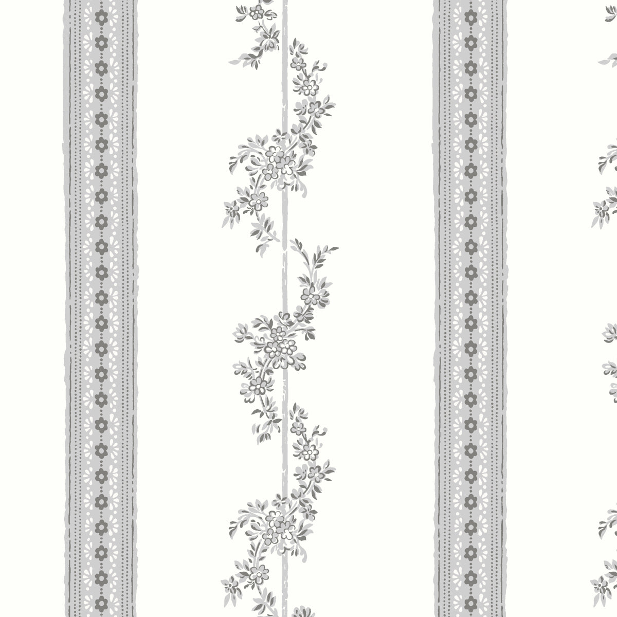 Grey wallpaper with vertical floral vines and lace-edged stripes.