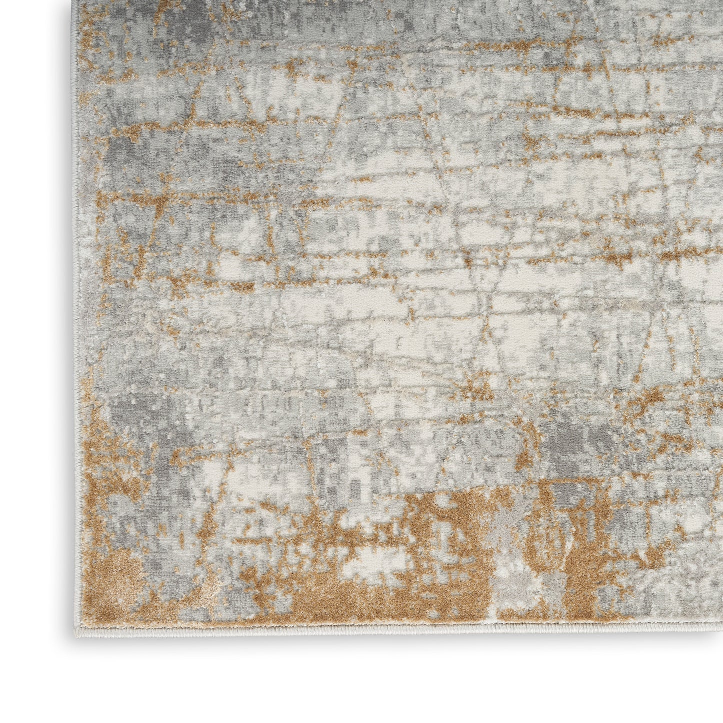 Rectangular area rug with abstract, distressed grey, ivory and tan pattern; soft plush pile.