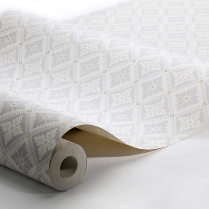 White wallpaper roll with pale gray floral geometric squares and tiny gold accents; decorative wallcovering.