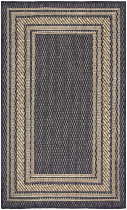 Rectangular navy rug with beige diagonal striped borders and a solid navy center; modern geometric border design.