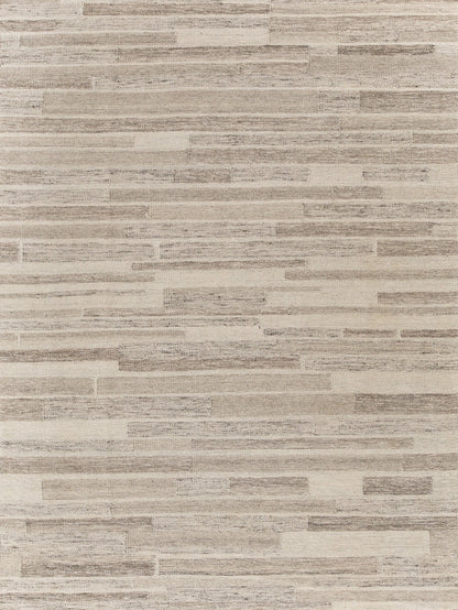 Beige taupe hand-loomed rug with a subtle linear weave; indoor Scandinavian-style rug.
