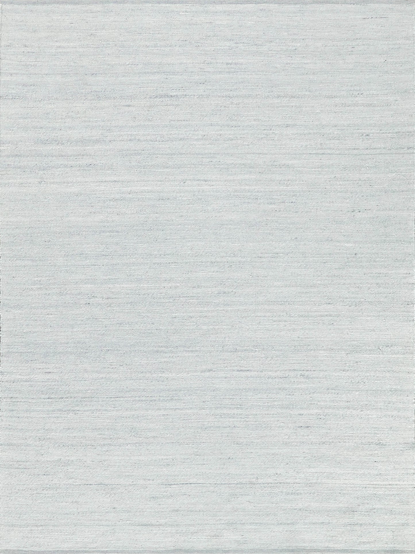 Light gray woven rug with subtle horizontal texture in modern flat-weave style.