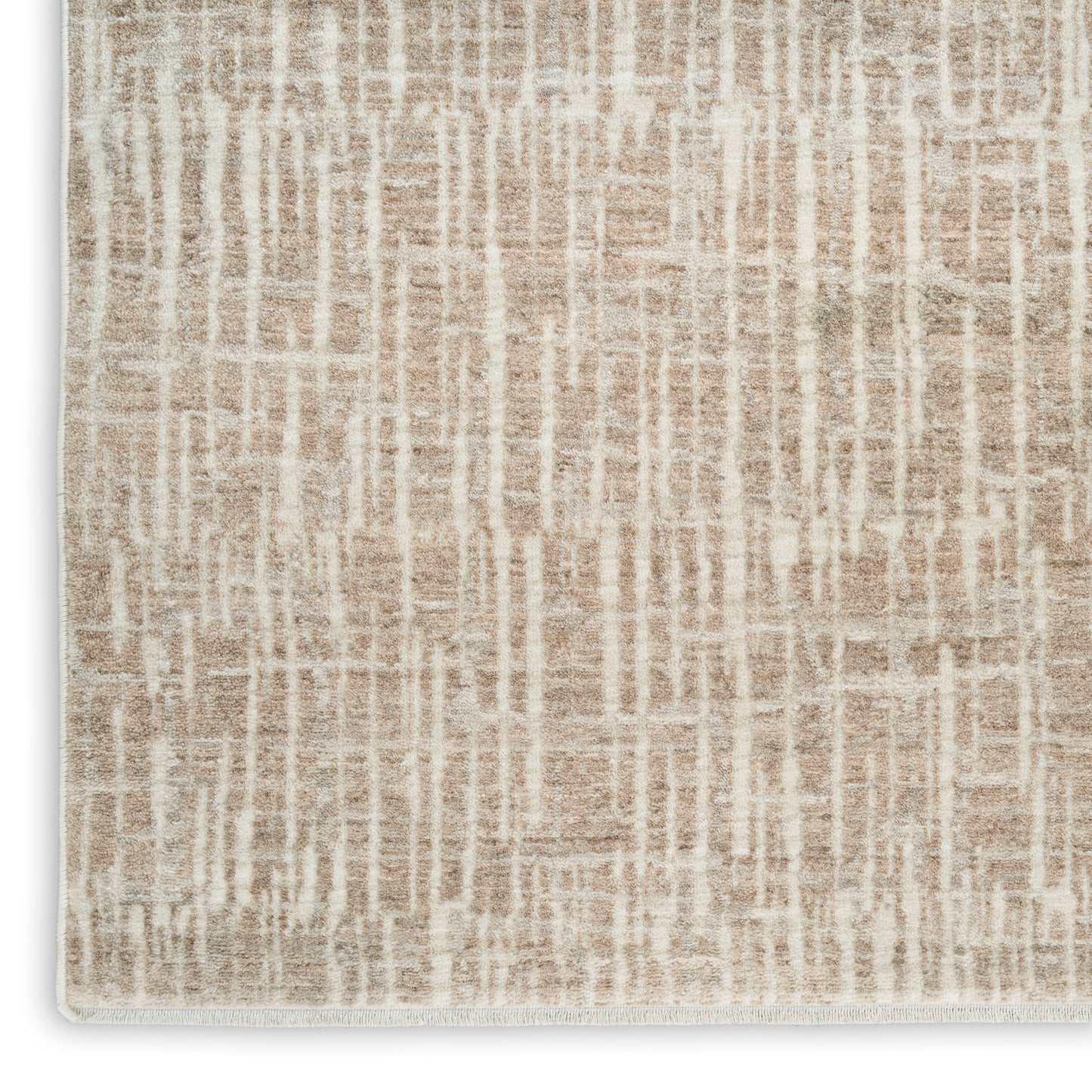 Beige abstract-pattern rug with cream vertical lines, soft textured pile and fringed edges.