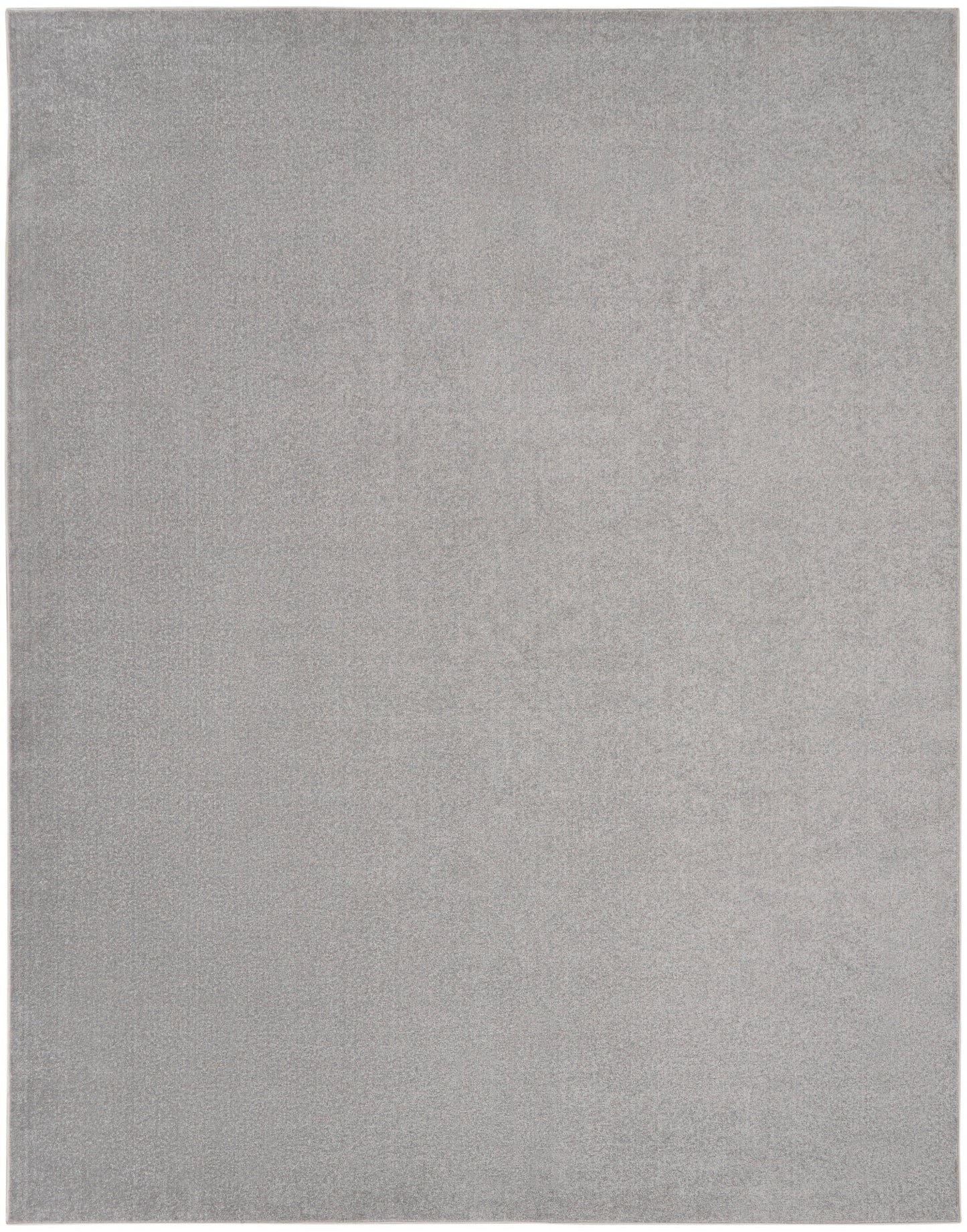 Light gray rectangular outdoor rug with a soft brushed texture; modern minimalist style; 7' x 10'.
