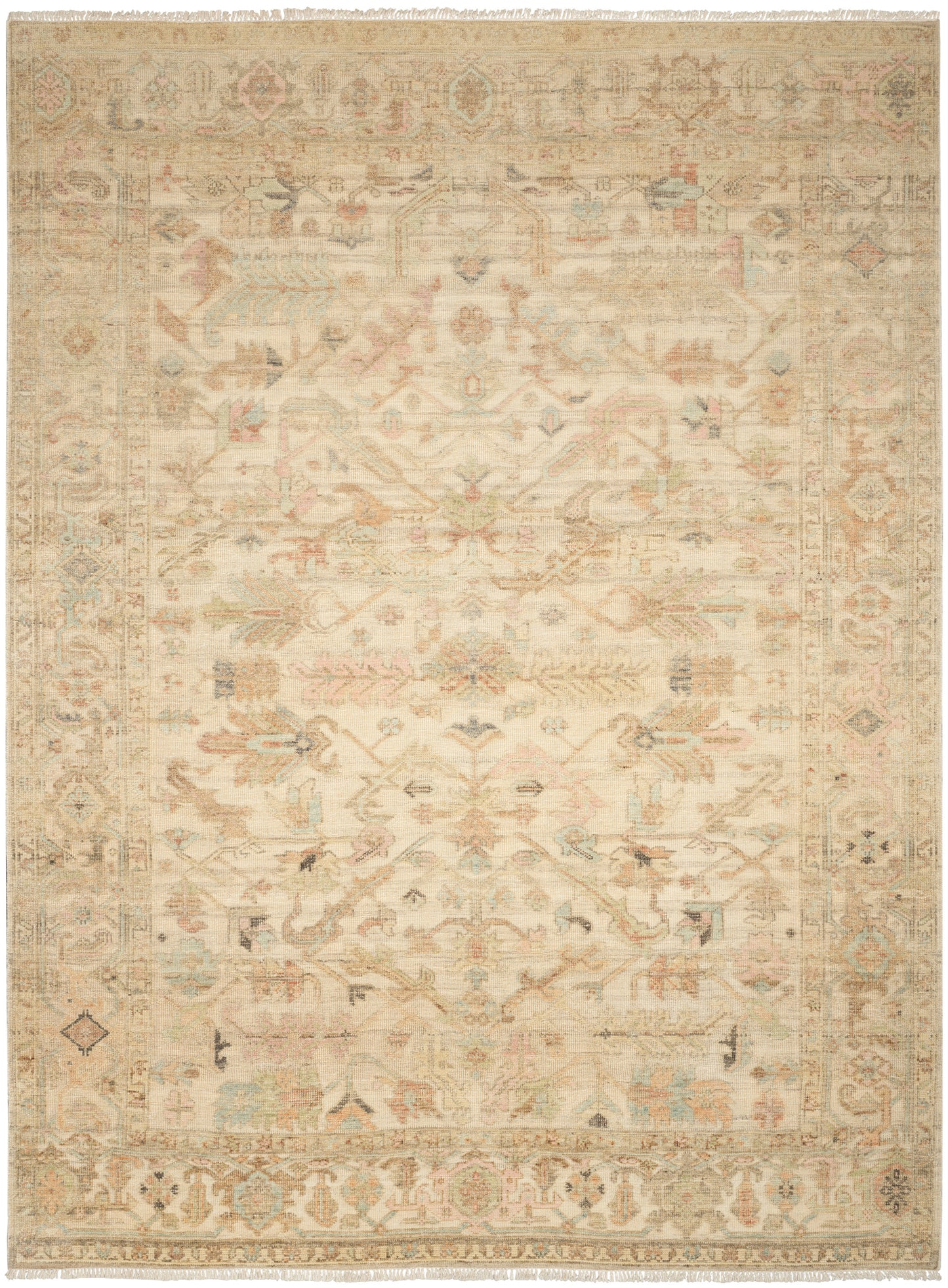 Distressed beige Persian-style area rug with pale pink, blue, & sage motifs, ornate border, fringe edges.