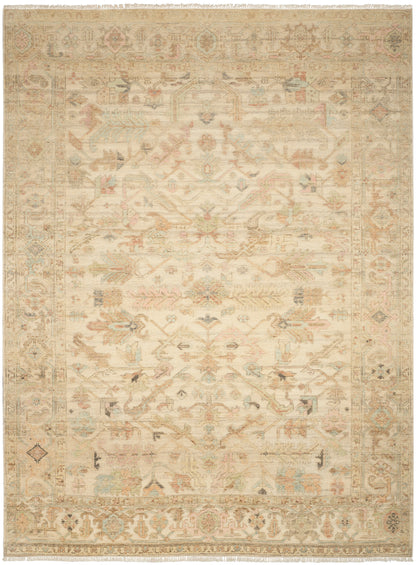 Distressed beige Persian-style area rug with pale pink, blue, & sage motifs, ornate border, fringe edges.