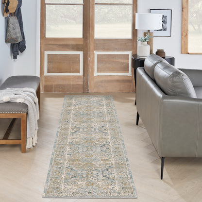 Long oriental runner rug in soft blues & beiges & golds laid in front of rustic wooden doors in a modern living room.