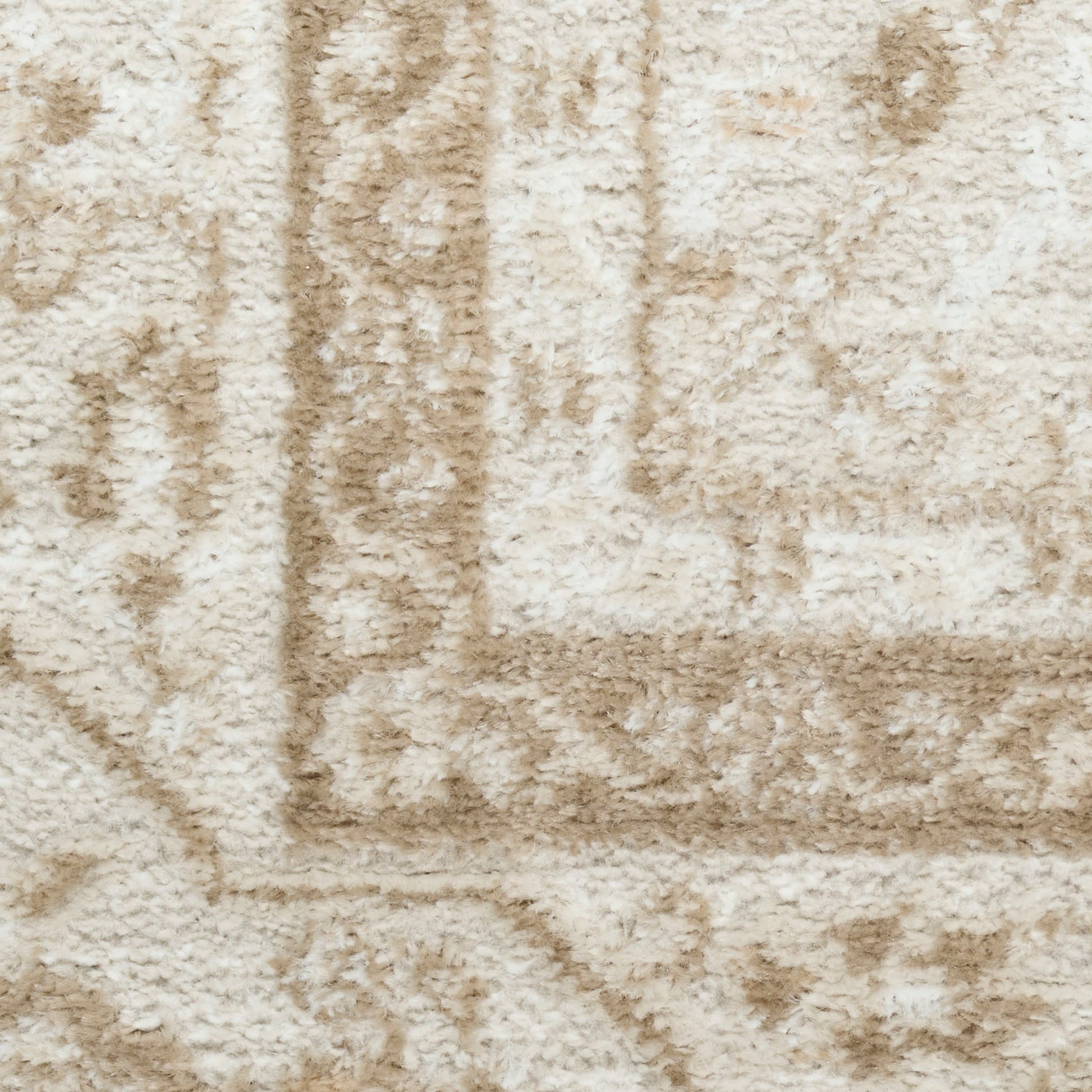 Cream and beige plush area rug with a subtle geometric border; soft thick pile for living room decor.