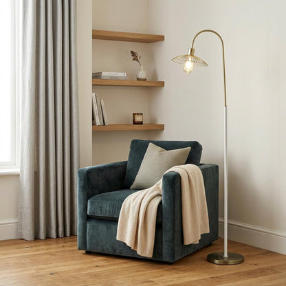 64" arched floor lamp with a gold finish and a gold metal cage shade with a white interior
