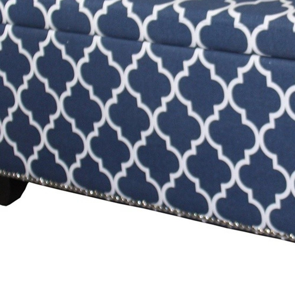 42-inch blue, white, and dark brown upholstered polyester quatrefoil bench with flip-top.