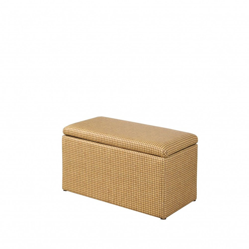 Rectangular 17" bench with yellow and brown upholstered faux leather and a flip-top lid, on short feet.