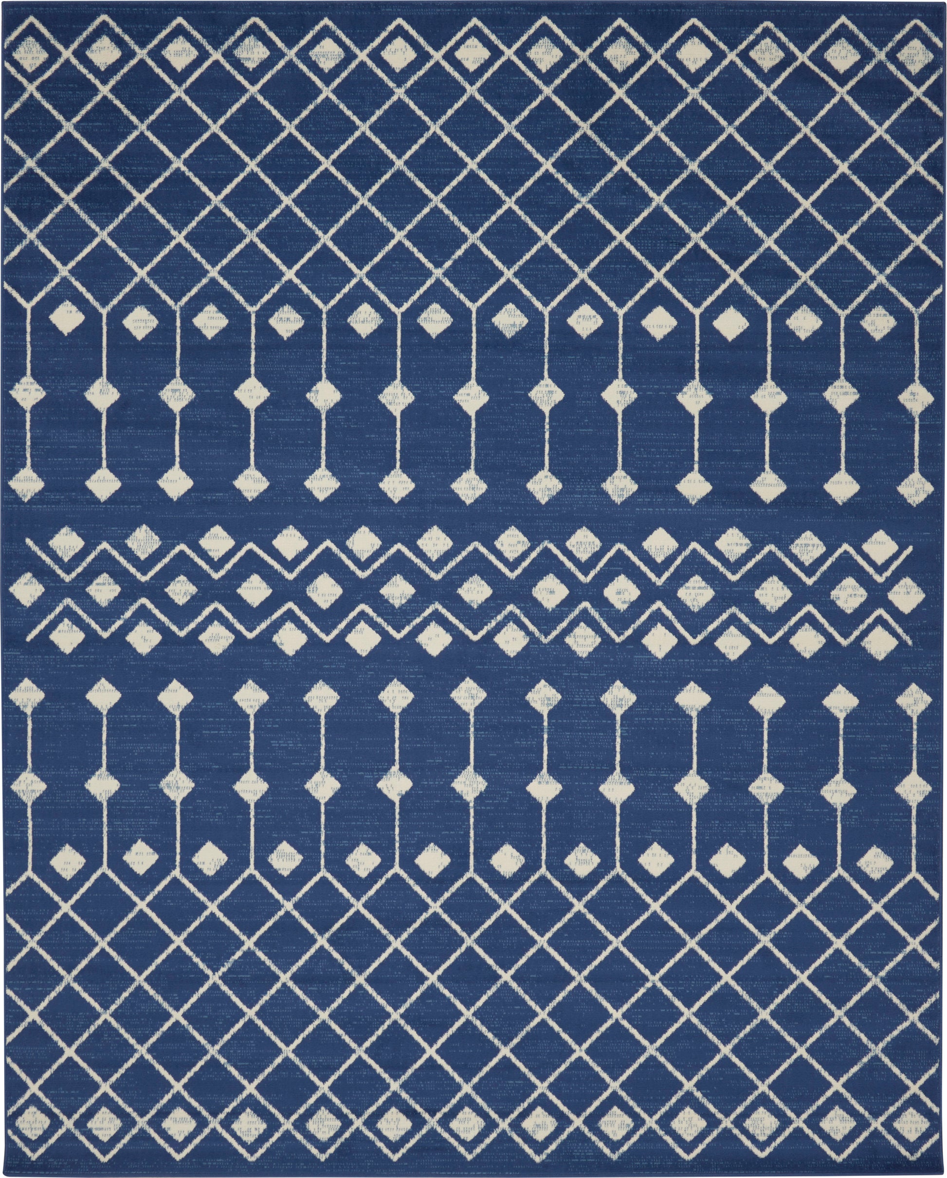 Navy blue rug with white diamond lattice pattern and vertical line motifs for contemporary decor.