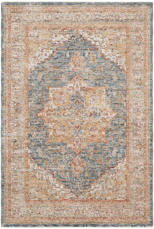 Distressed vintage oriental area rug with blue field, ivory and rust medallion, and ornate floral border.