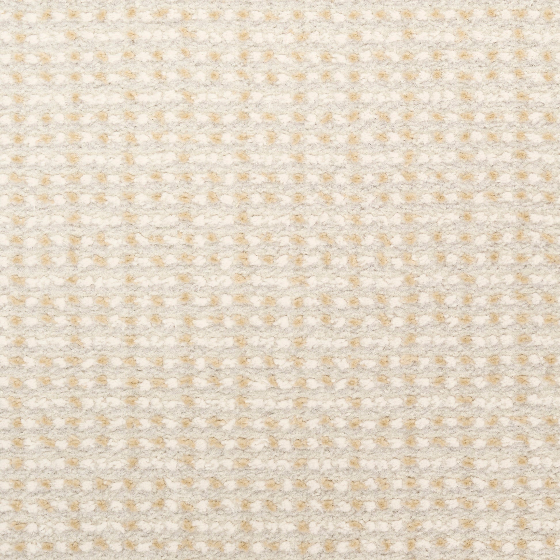 Beige textured textile with tiny raised dot grid pattern, soft and cozy.