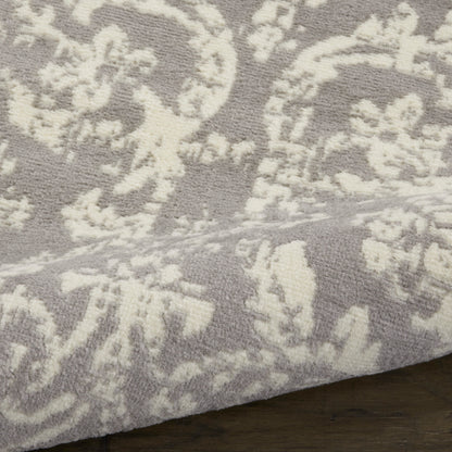 Gray rug with ivory damask pattern, plush soft pile, rectangular, traditional-modern style for living spaces.
