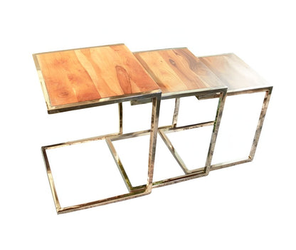 Three C-shaped wood and metal nesting end tables with warm wood tops and brushed metal frames.