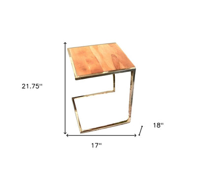 Set of three copper-toned metal & wood C-shaped nesting end tables with warm wood tops.