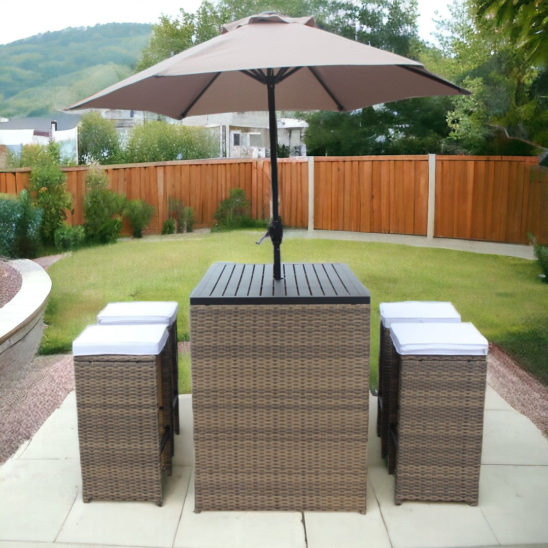 Six Piece Brown and White Faux Wicker Outdoor Bar Height Table Set with Umbrella and Stools