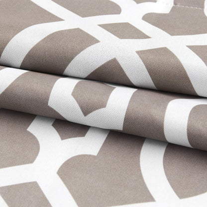 Taupe trellis blackout window curtain panel, 84" long, folded in layers.