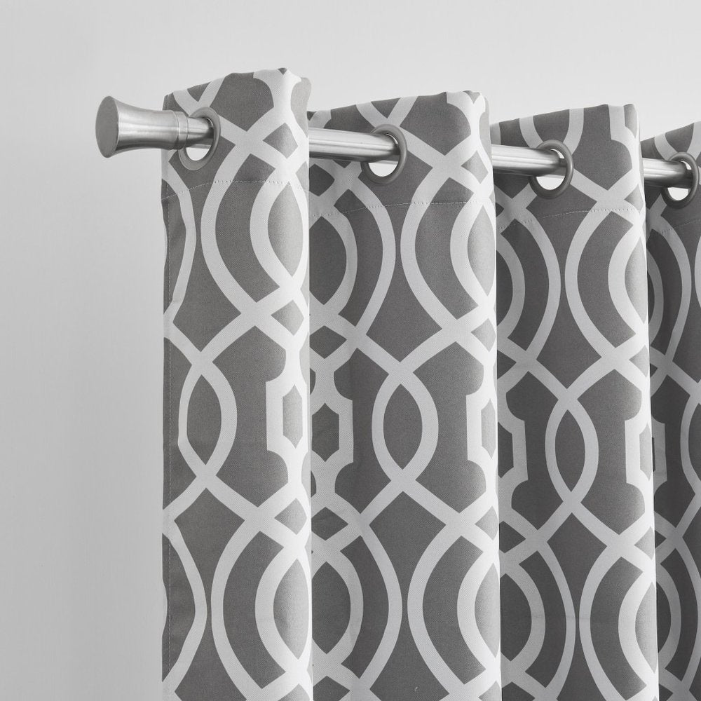 Gray trellis curtain panel with white geometric lattice pattern; silver grommet header for modern drapery.