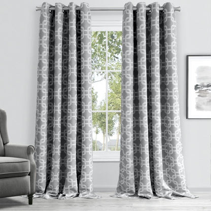 Soft silver-grey fabric window curtain panel with a white interlocking chain pattern, floor-length for a modern living room window