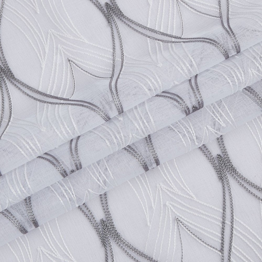 Set of two white sheer window panels, 84" long, with wave embroidery.