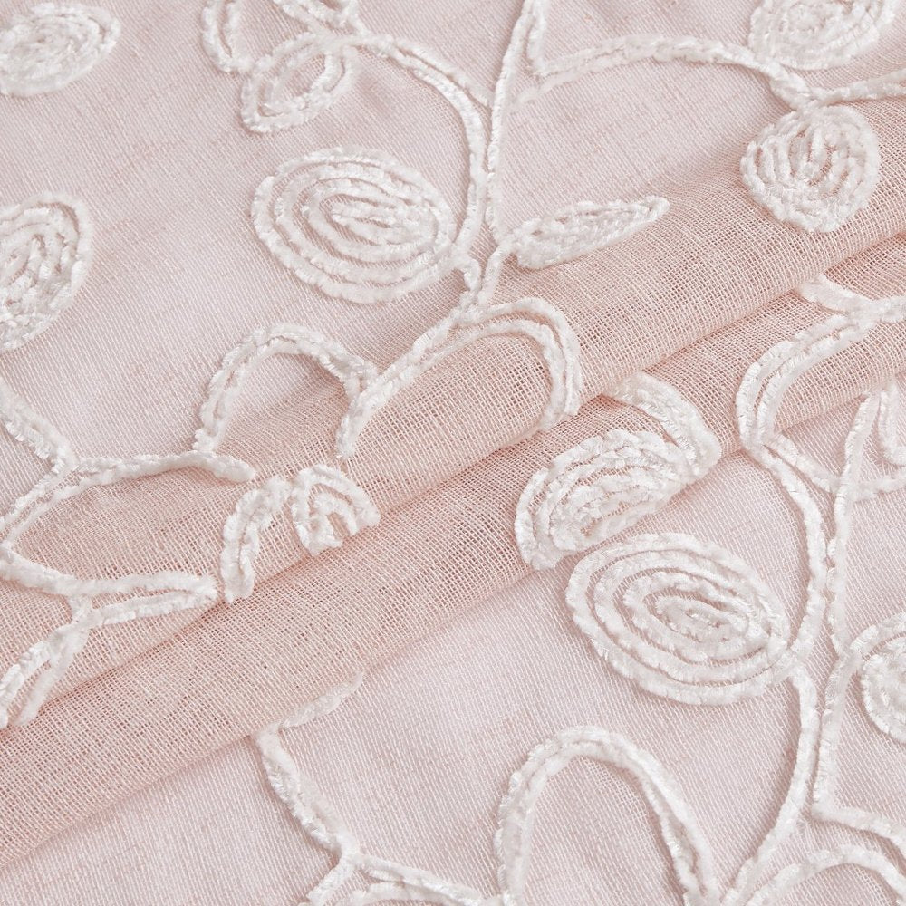 Set of two blush floral embroidered window panels, each 84 inches long.