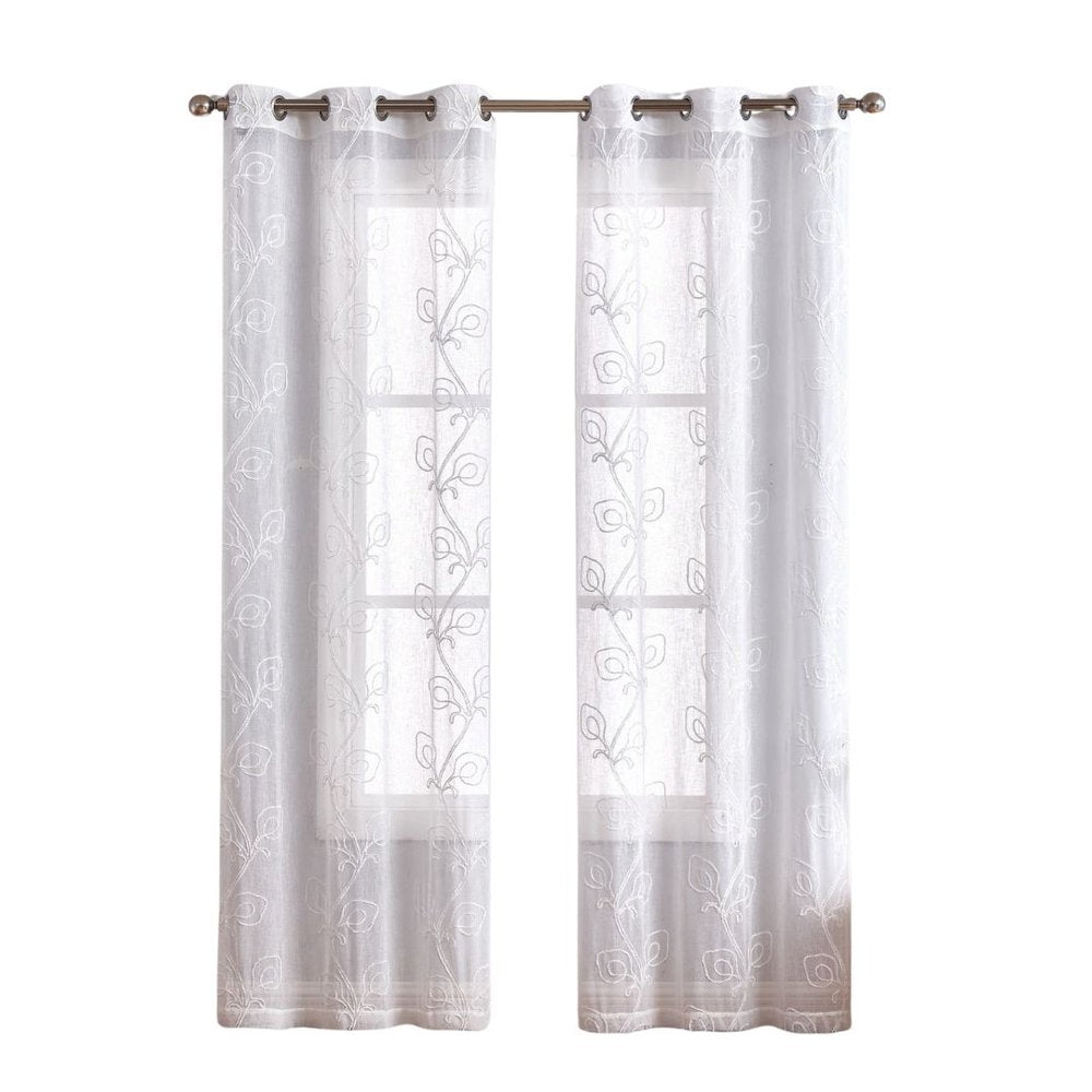 White sheer voile curtains with subtle vine embroidery, hung on a bronze rod with rings for airy window privacy.