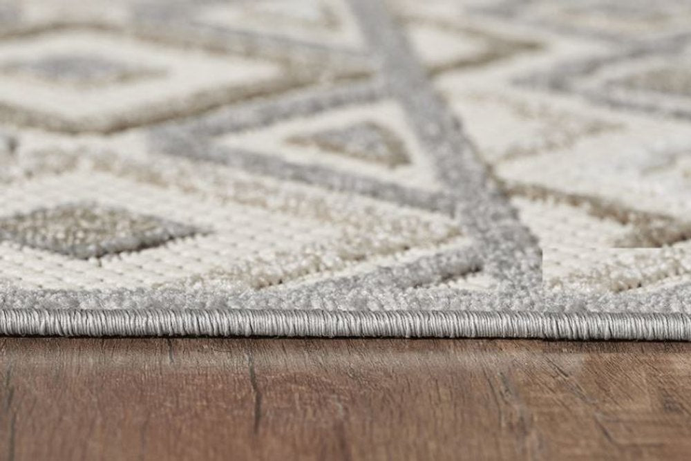 8' Round Gray and Ivory Southwestern stain-resistant indoor/outdoor area rug