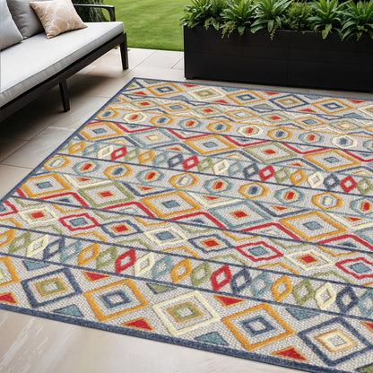 5' X 7' Ivory And Blue Southwestern Stain Resistant Indoor Outdoor Area Rug