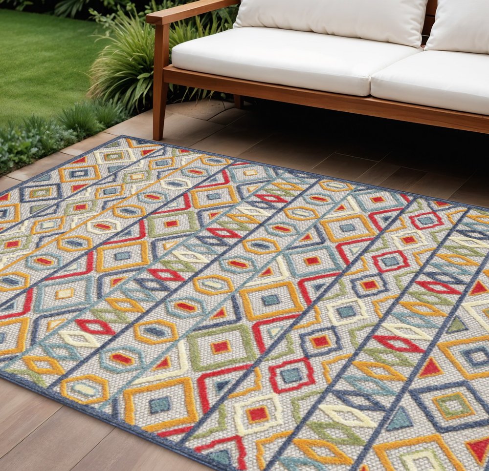 7' X 9' Ivory And Blue Southwestern Stain Resistant Indoor Outdoor Area Rug