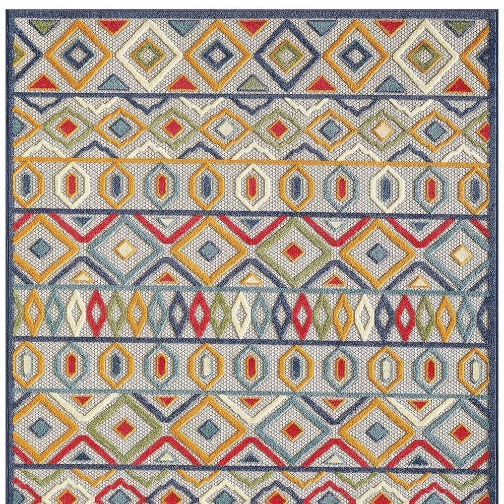 7' X 9' Ivory And Blue Southwestern Stain Resistant Indoor Outdoor Area Rug
