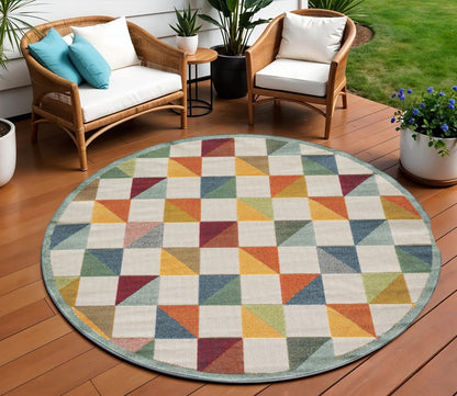 8' Round Orange And Ivory Round Geometric Stain Resistant Indoor Outdoor Area Rug