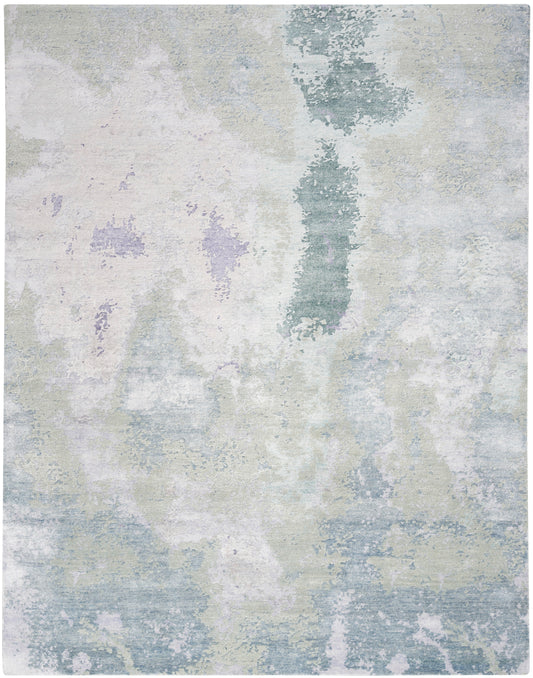 Rectangular area rug with soft pastel watercolor pattern in blues, greens, and lavender; abstract modern style.