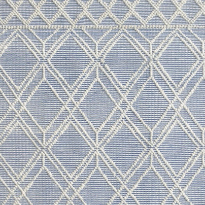 5' X 7' Blue and Ivory Geometric Handmade Area Rug