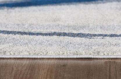 3' X 5' Ivory and Blue Abstract Area Rug