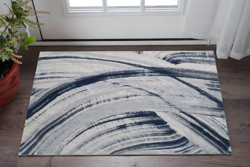 3' X 5' Ivory and Blue Abstract Area Rug