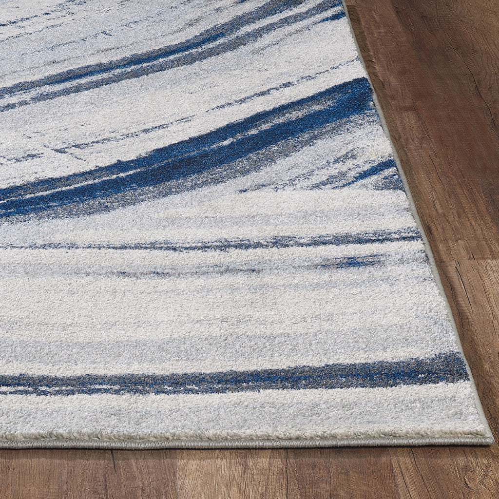 5' X 8' Ivory and Blue Abstract Area Rug