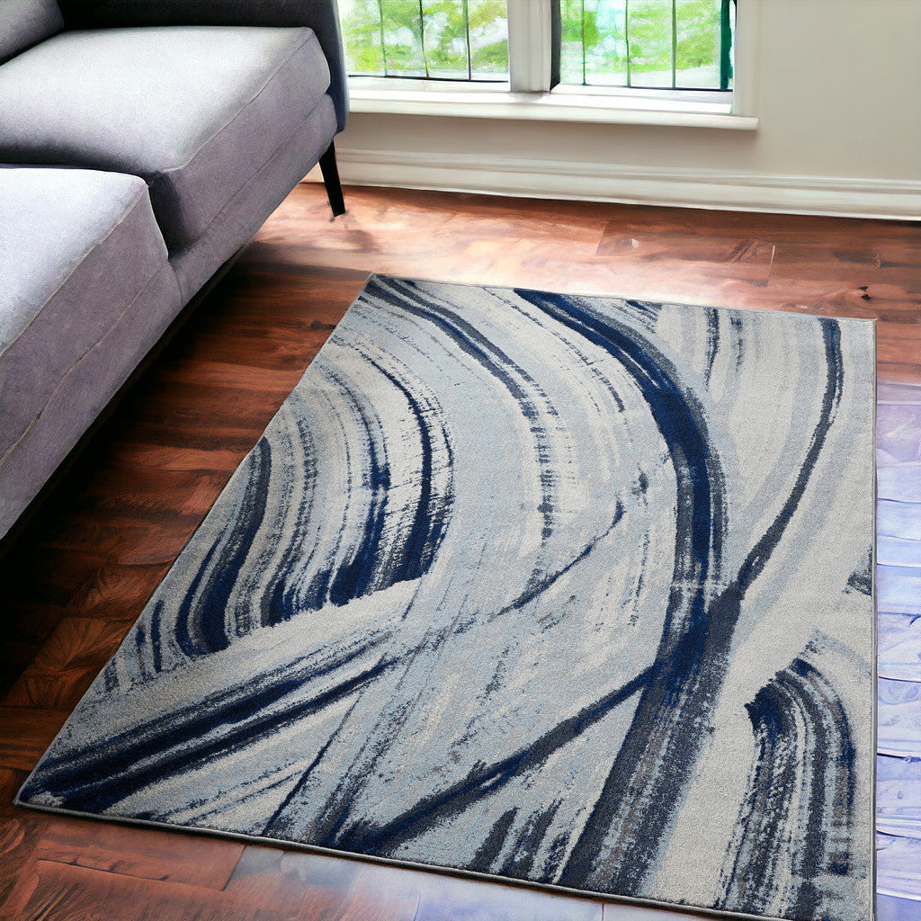 5' X 8' Ivory and Blue Abstract Area Rug