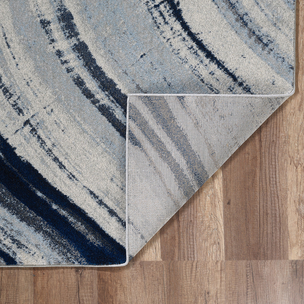 7' x 10' Ivory and Blue Abstract Area Rug
