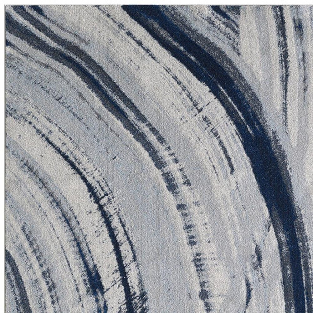 8' X 11' Ivory and Blue Abstract Area Rug